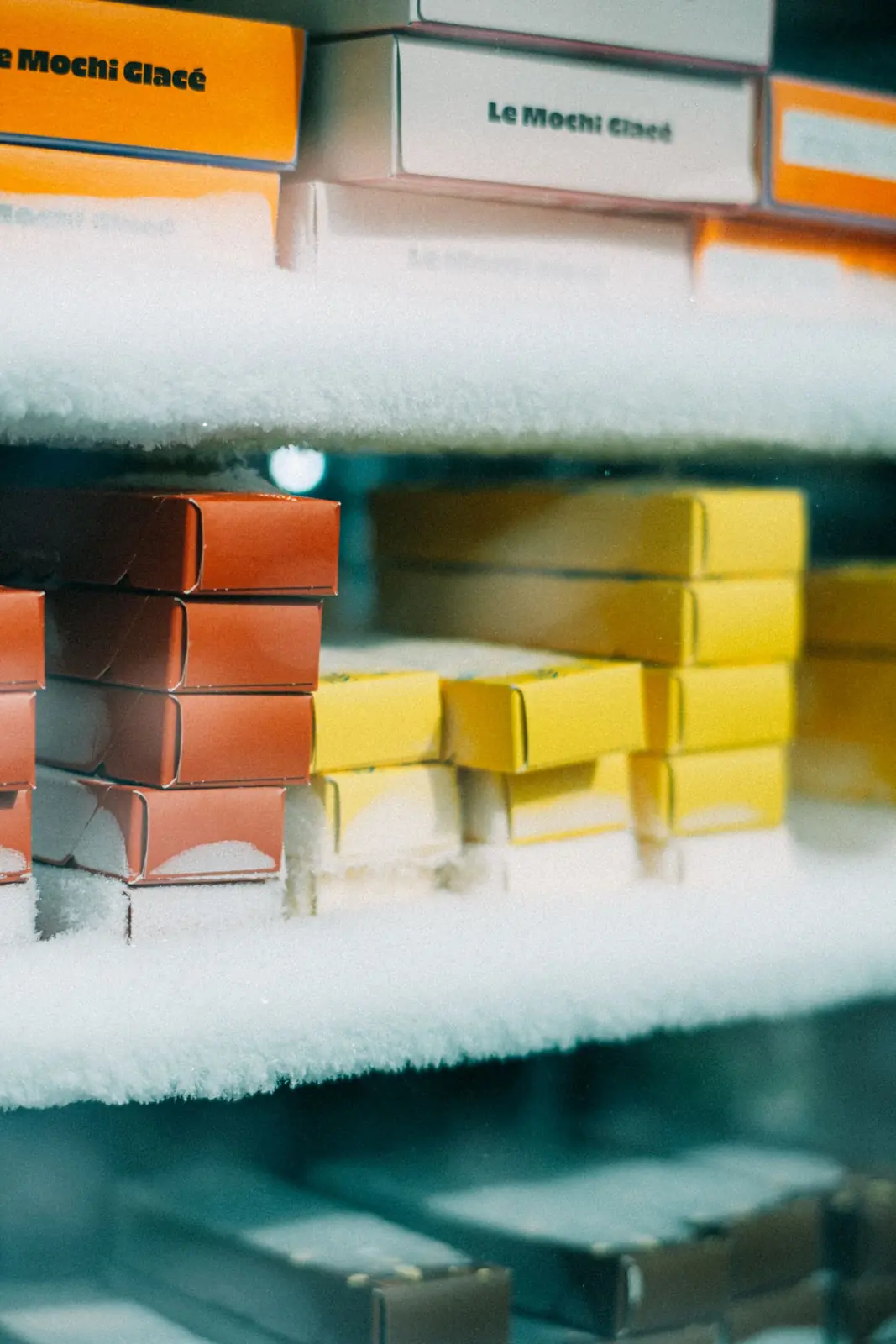 Frost on boxes inside a freezer