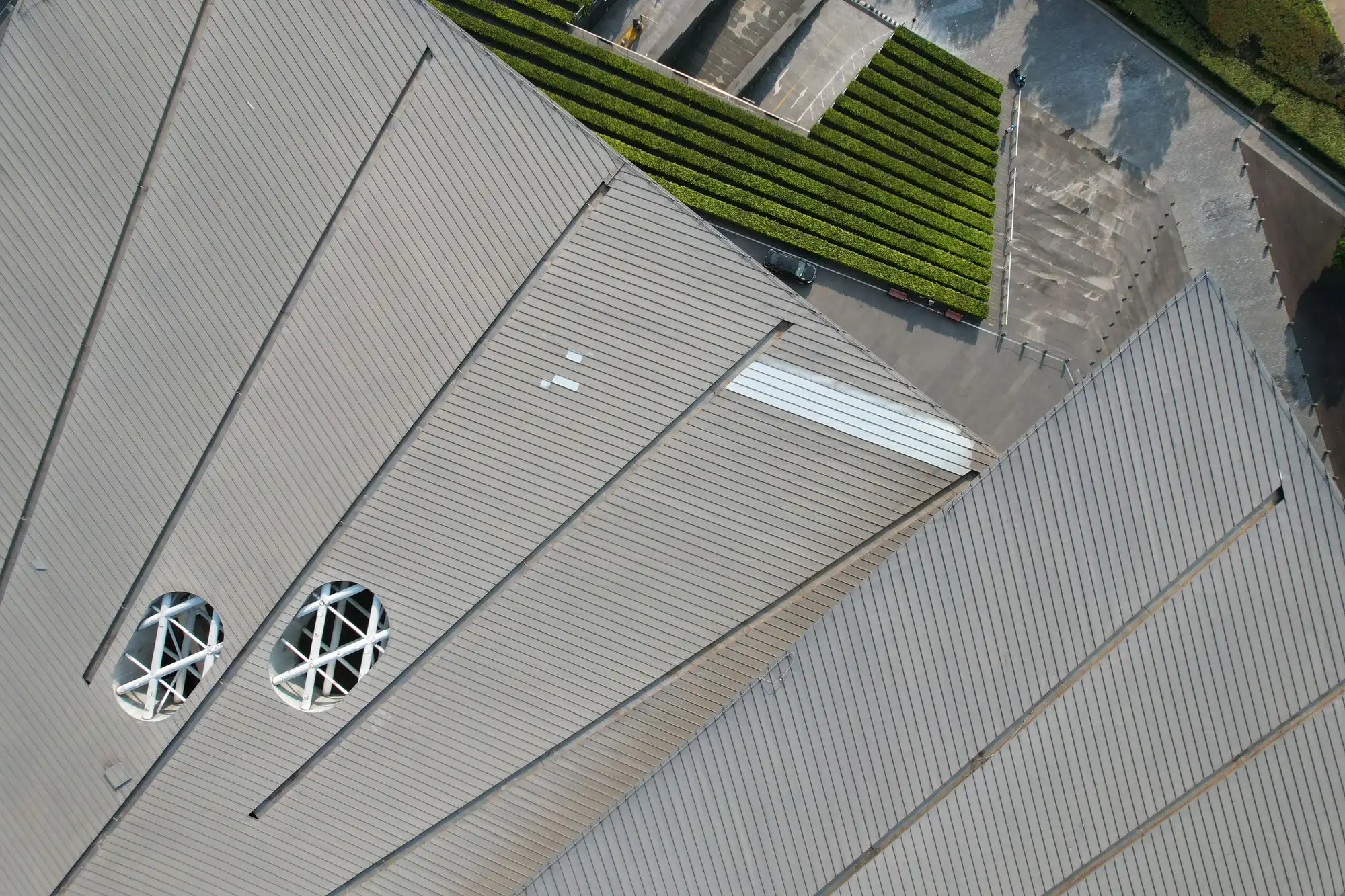 Aerial view of green metal panel roofs