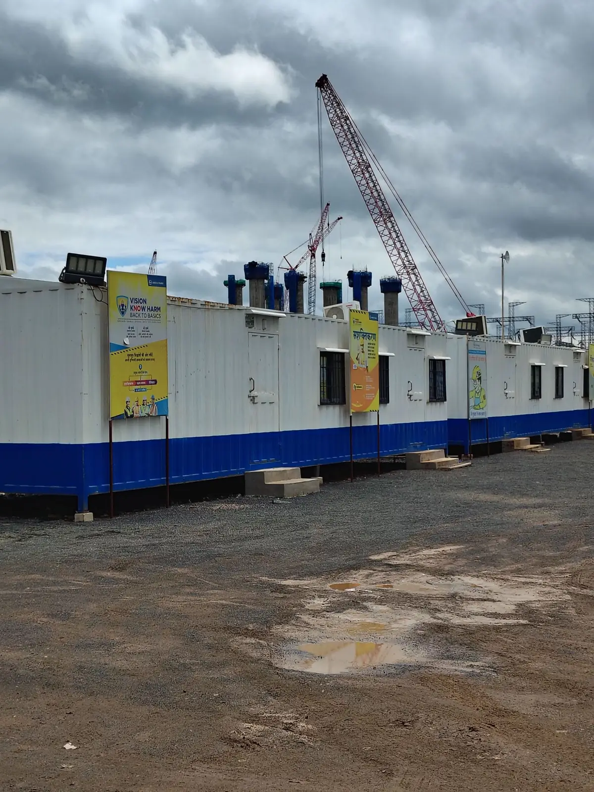 Row of prefab site offices at a project in Gadarwara, India
