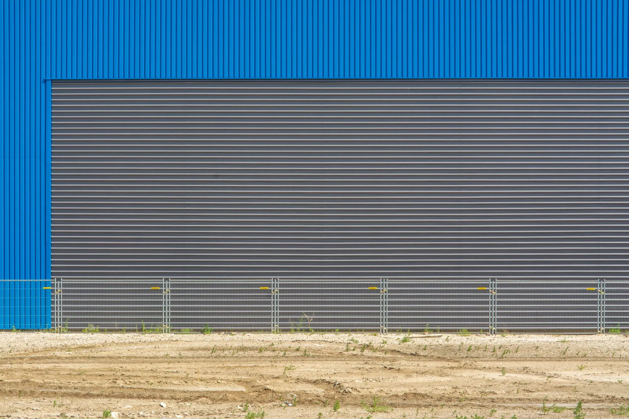 Long blue insulated panel wall